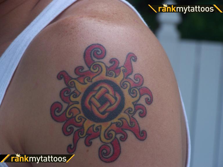 Color Ink Celtic Sun Tattoo On Left Shoulder