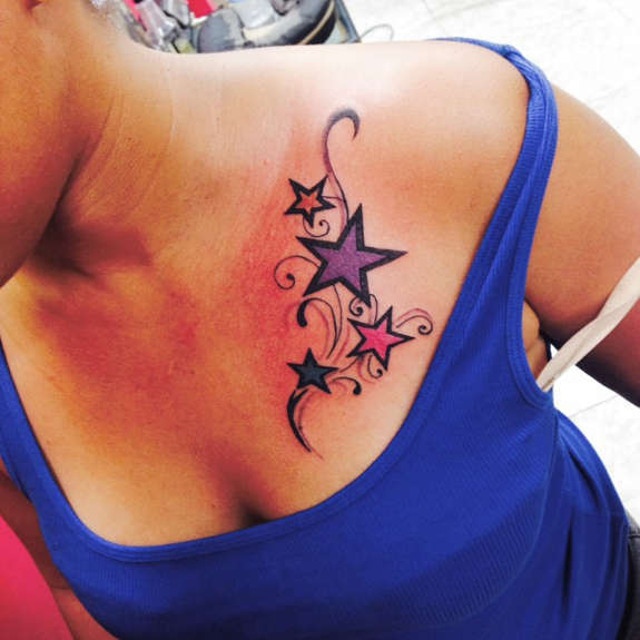 Color Ink Shooting Stars Tattoo On Girl Front Shoulder