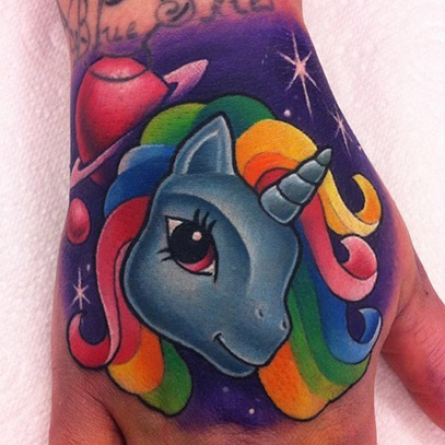 Colored Unicorn Head Tattoo On Hand
