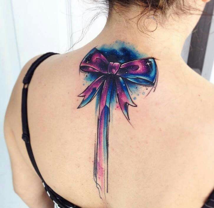 Colorful Bow Tattoo On Girl Upper Back