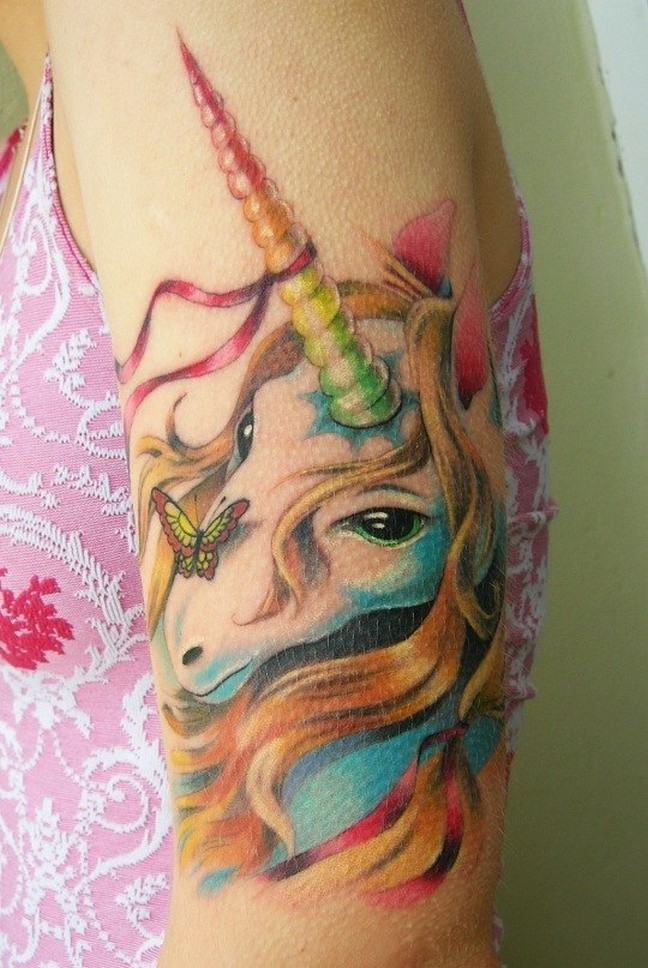 Colorful Feminine Unicorn Tattoo On Girl Left Half Sleeve