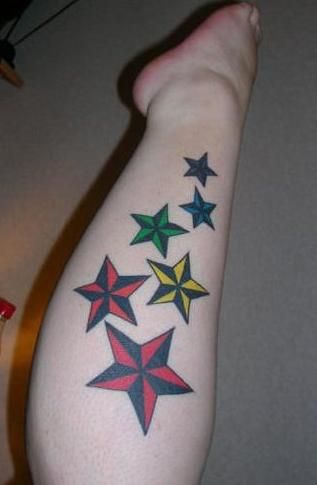 Colorful Nautical Star Tattoos On Side Leg