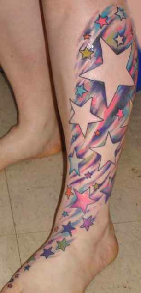 Colorful Shooting Stars Tattoo On Left Leg