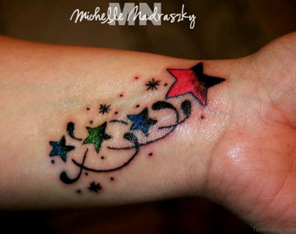 Colorful Shooting Stars Tattoo On Left Wrist