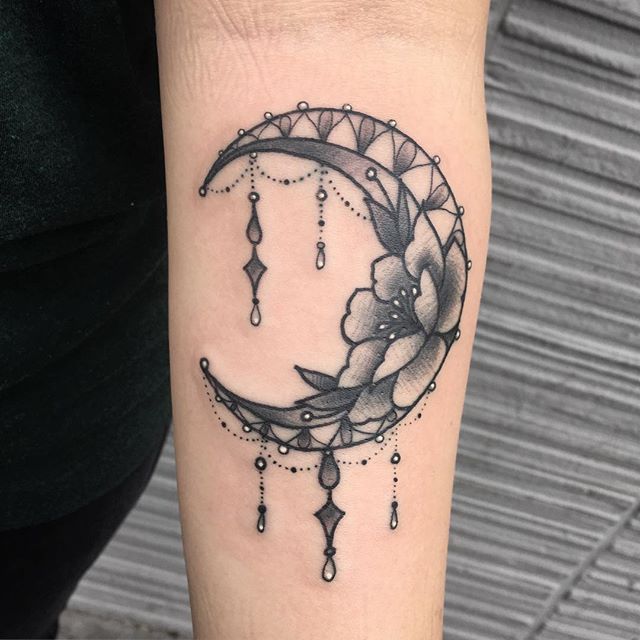 Crescent Moon Tattoo On Left Forearm