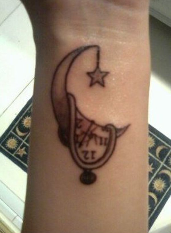 Crescent Moon Tattoo On Left Wrist
