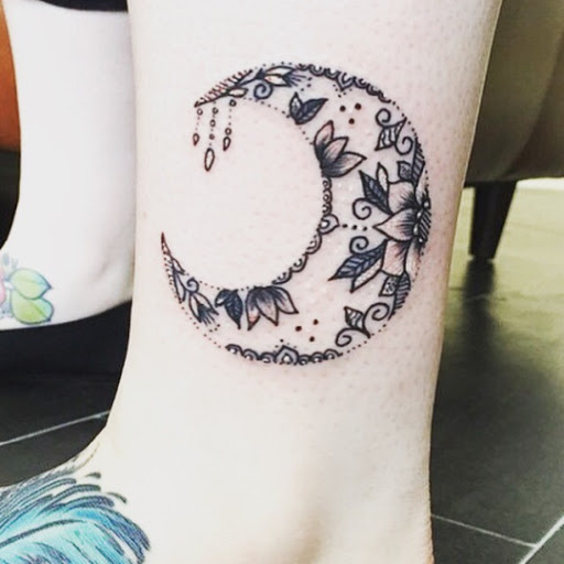 Crescent Moon Tattoo On Side Leg