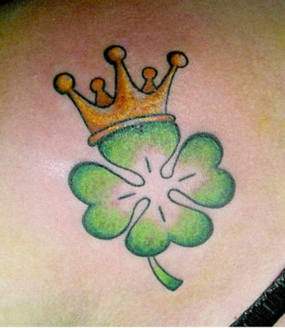 Crown With Shamrock Leaf Tattoo On Back Shoulder