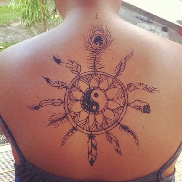 Dreamcatcher With Peacock Feather Tattoo On Girl Upper Back
