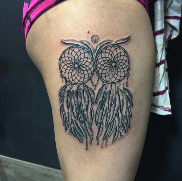 Dreamcatchers In Owl Shape Tattooed On Side Thigh