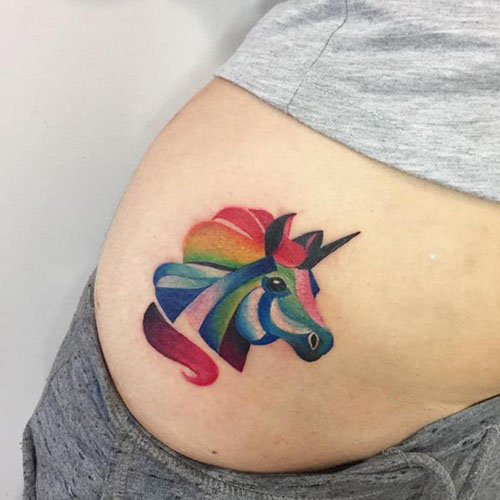 Feminine Colored Unicorn Tattoo On Hip