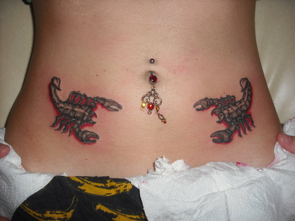 Feminine Scorpion Tattoos On Both Hips