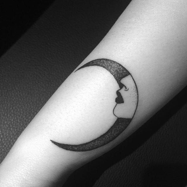 Girl Face In Moon Tattoo On Arm