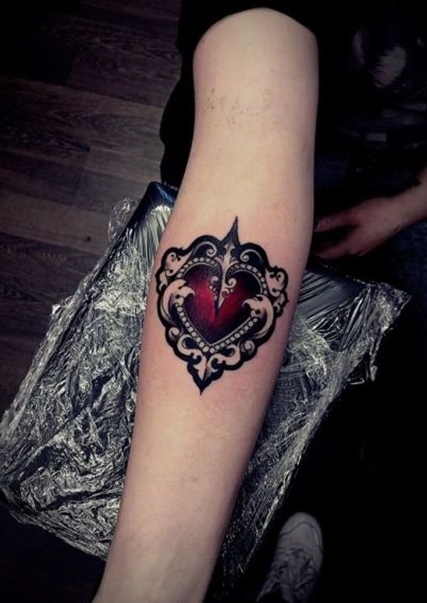 Girl Showing Her Heart In Mirror Frame Tattoo On Forearm