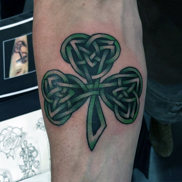 Green And White Celtic Shamrock Tattoo On Right Forearm