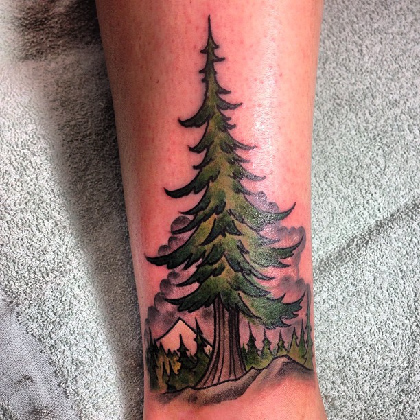 Green Ink Pine Tree Tattoo On Side Leg