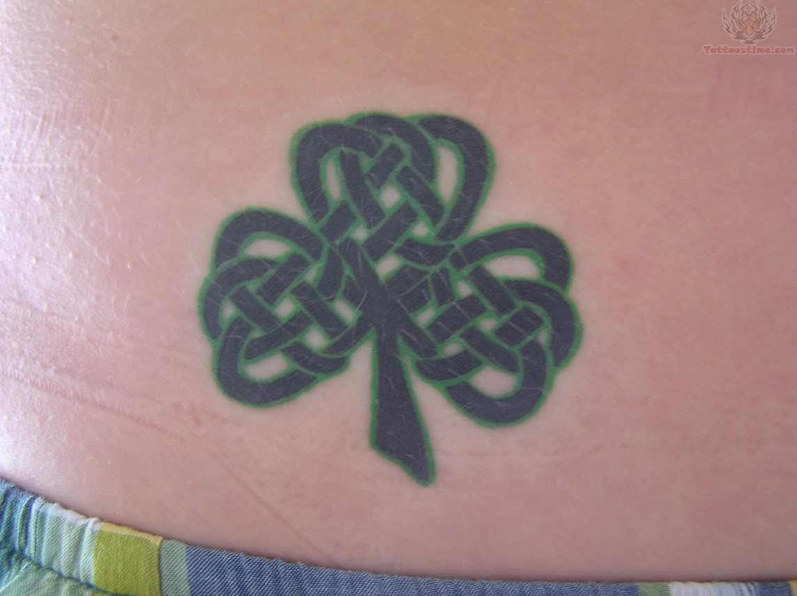 Green Outline Black Celtic Shamrock Tattoo On Hip