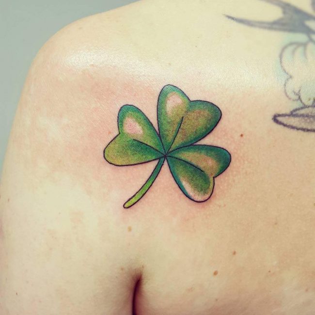 Green Shamrock Leaf Tattoo On Girl Shoulder