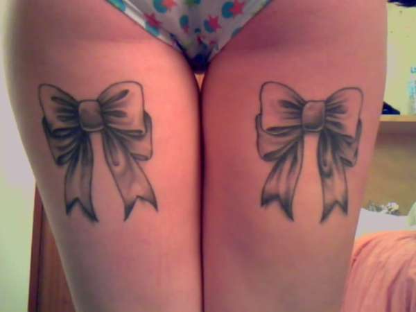Grey And Black Bow Tattoos On Both Thighs