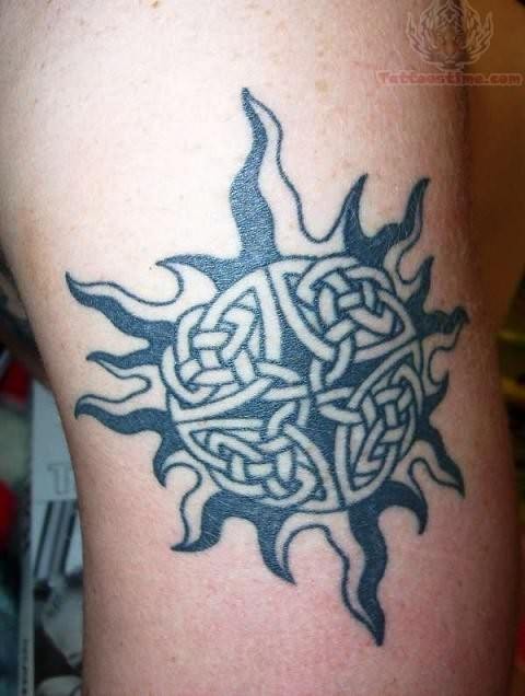 Grey And Black Celtic Sun Tattoo Idea