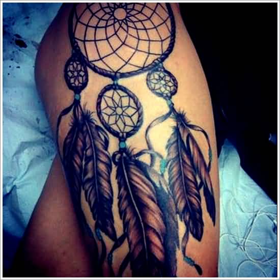 Grey And Black Dreamcatcher Tattoo On Girl Left Thigh