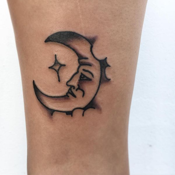 Grey And Black Half Moon Tattoo On Leg