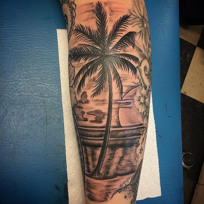 Grey And Black Ink Palm Tree Tattoo On Leg