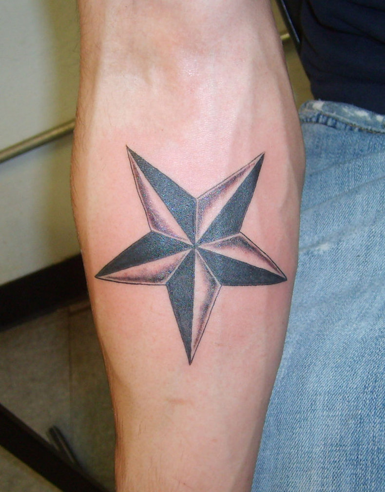 Grey And Black Nautical Star Tattoo On Right Forearm