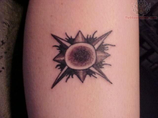 Grey And Black Small Sun Tattoo