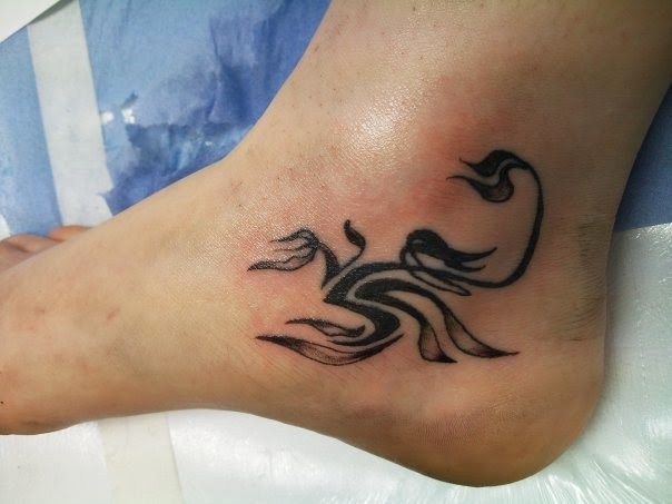 Grey And Black Tribal Feminine Scorpion Tattoo On Ankle