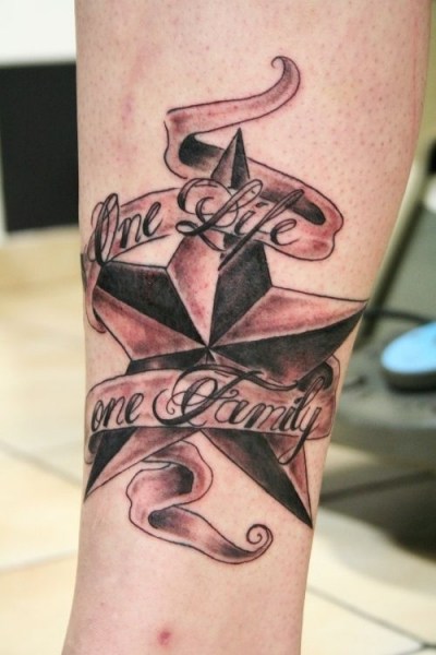 Grey Ink Banner And Nautical Star Tattoo On Leg