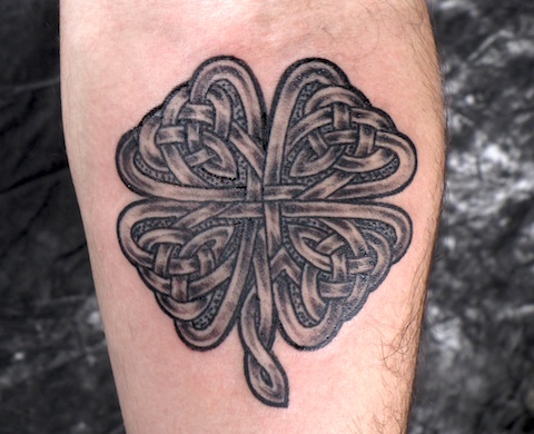 Grey Ink Celtic Shamrock Tattoo On Forearm