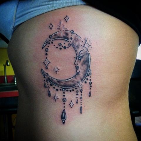 Grey Ink Crescent Moon Tattoo On Rib Side