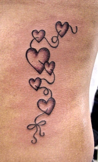 Grey Ink Hearts Tattoos On Side Rib