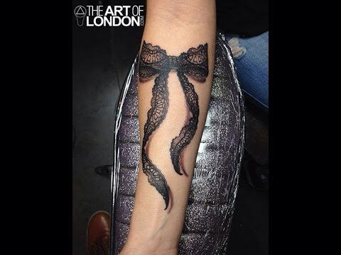 Lace Bow Tattoo On Right Forearm