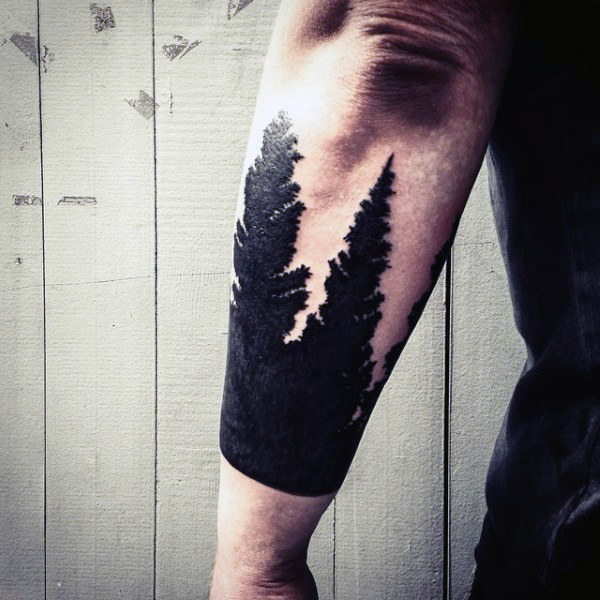 Left Arm Black Ink Pine Tree Tattoo