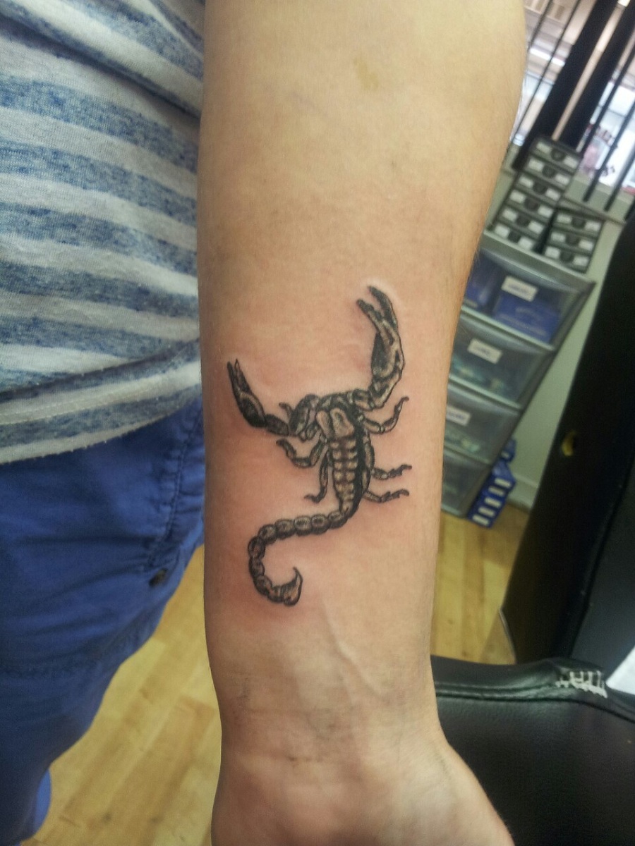 Left Forearm Small Scorpion Tattoo