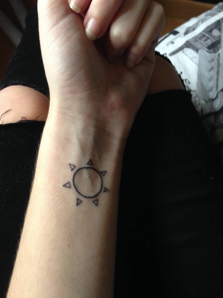 Left Wrist Simple Sun Tattoo Idea