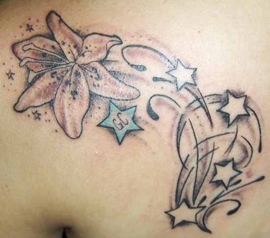 Lily Flower And Shooting Stars Tattoo On Back Shoulder