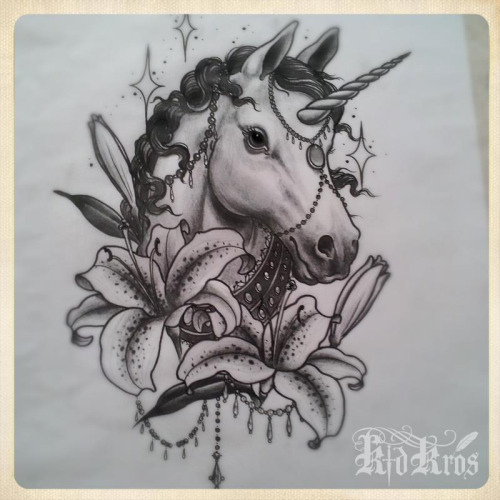 Lily Flowers And Unicorn Head Tattoo Design