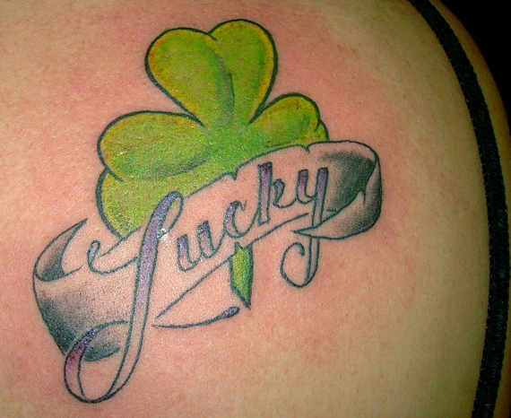 Lucky Banner And Celtic Shamrock Tattoo On Back Shoulder