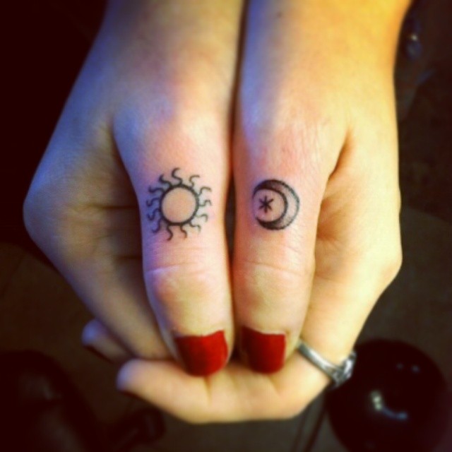 Moon and Sun Tattoos On Both Thumbs