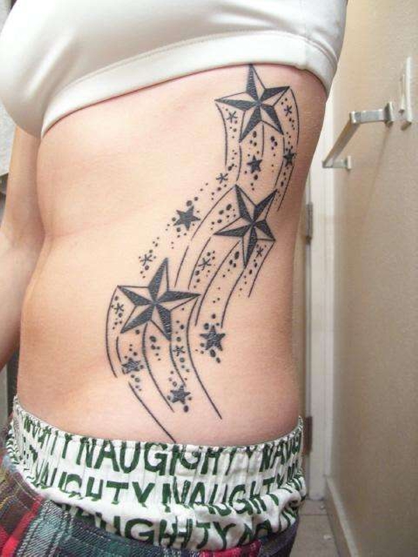 Nautical Shooting Stars Tattoo On Girl Side Rib
