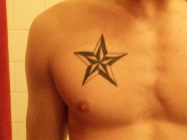 Nautical Star Tattoo On Man Chest