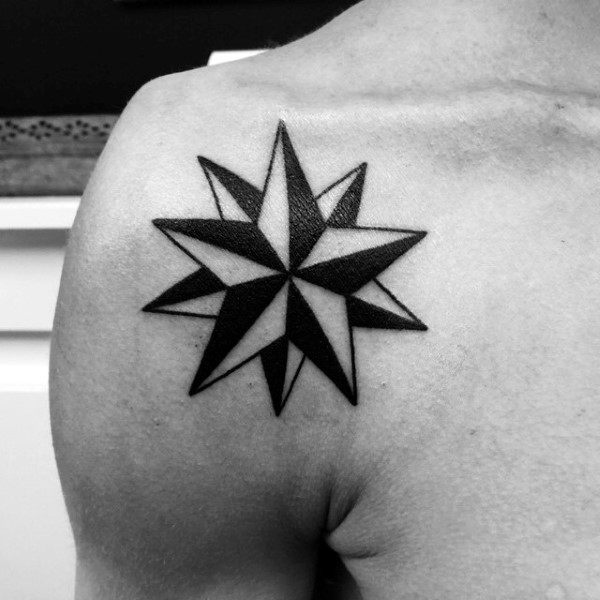 Nautical Star Tattoo On Man Front Shoulder