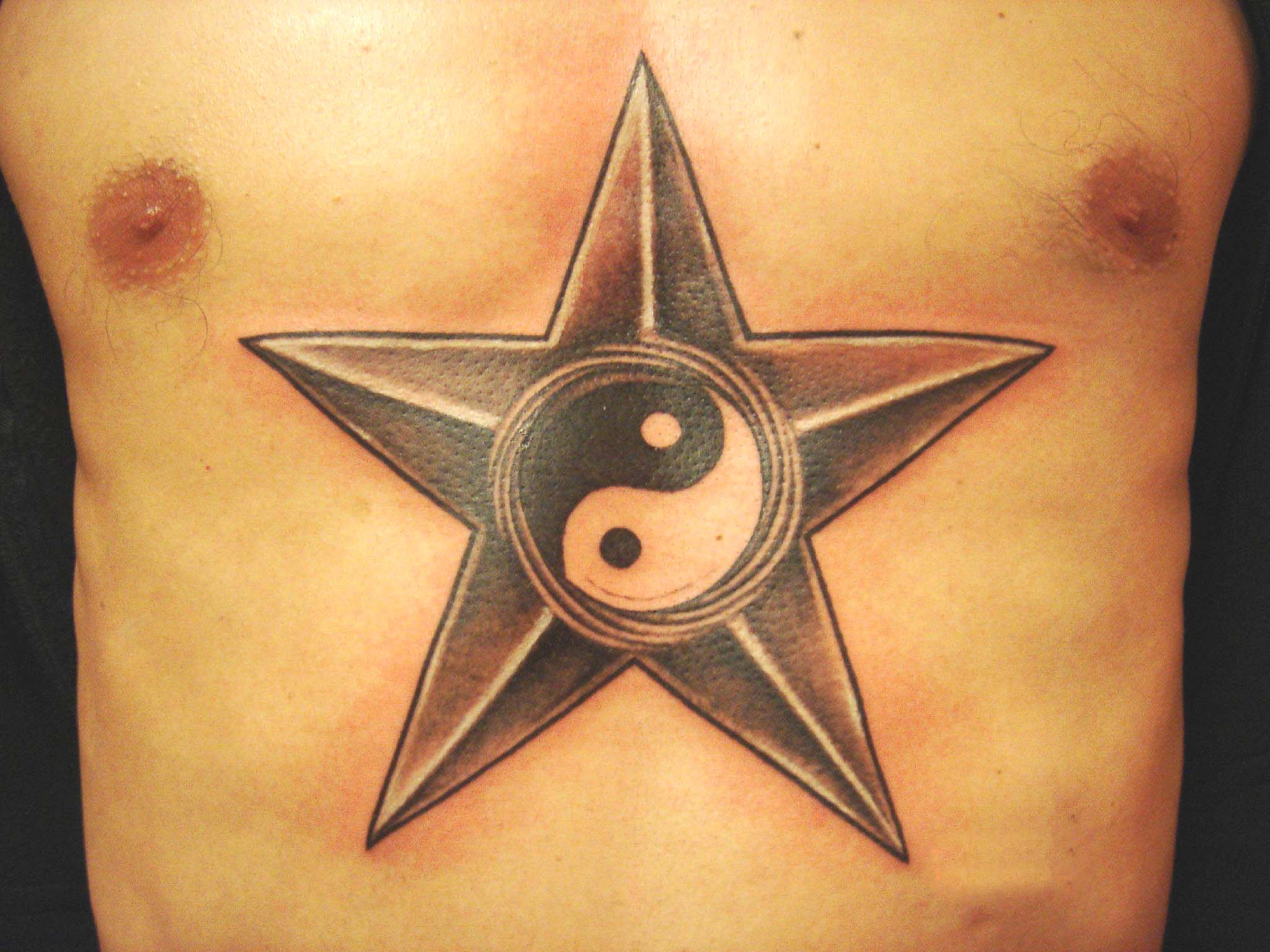Nautical Star With Yin Yang Symbol Tattoo On Man Chest
