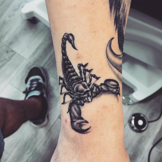 Nice Grey And Black Scorpion Tattoo On Arm Sleeve