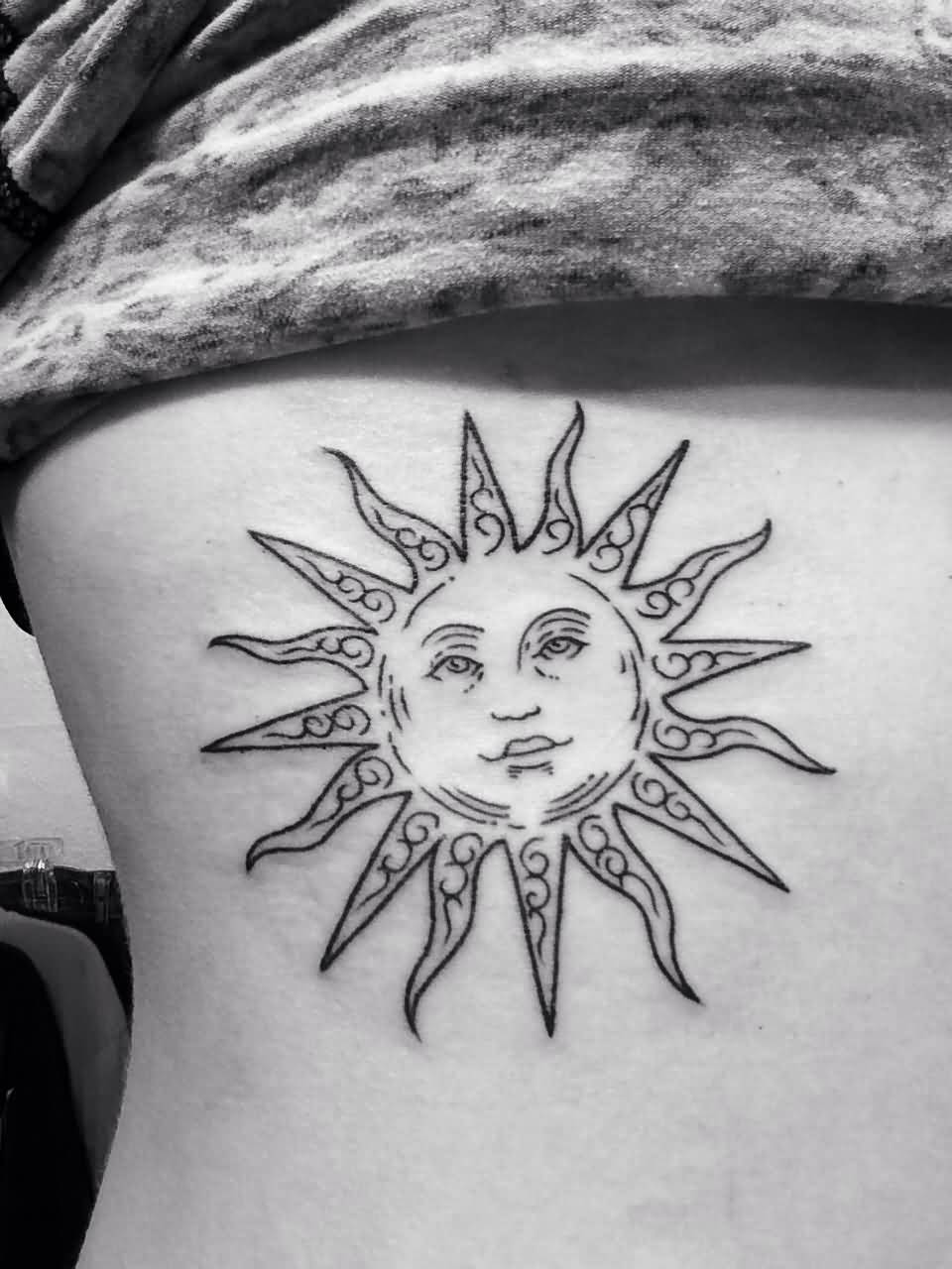 Nice Grey And White Sun Tattoo On Rib Side