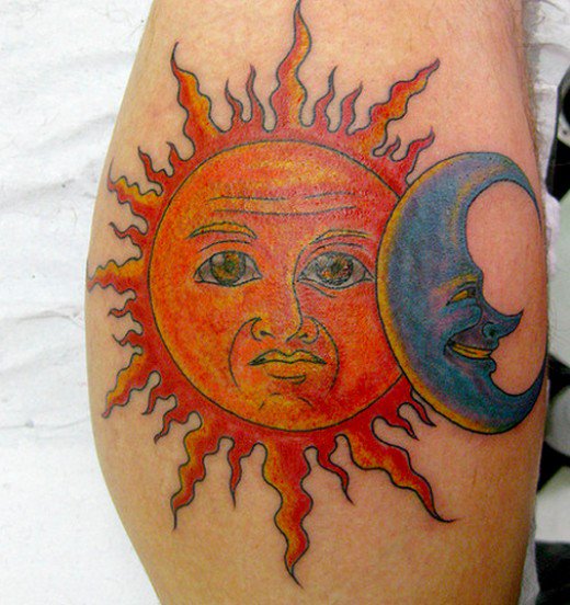Orange Ink Sun And Blue Moon Tattoo On Right Arm