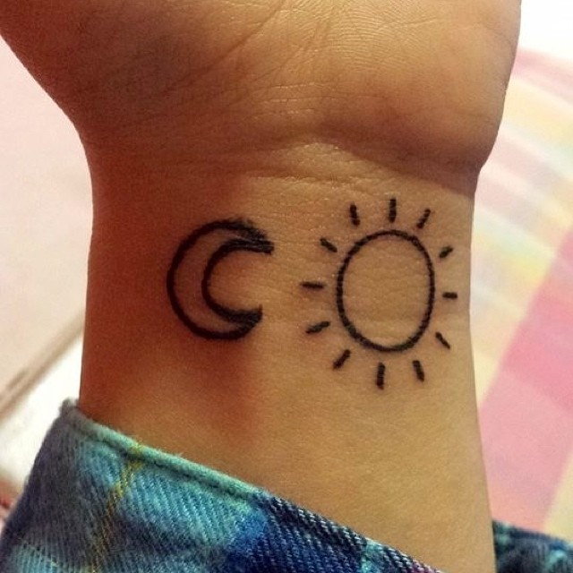 Outline Moon And Small Sun Tattoo On Left Wrist